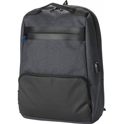 Image of PVC backpack with anti-theft back pocket.